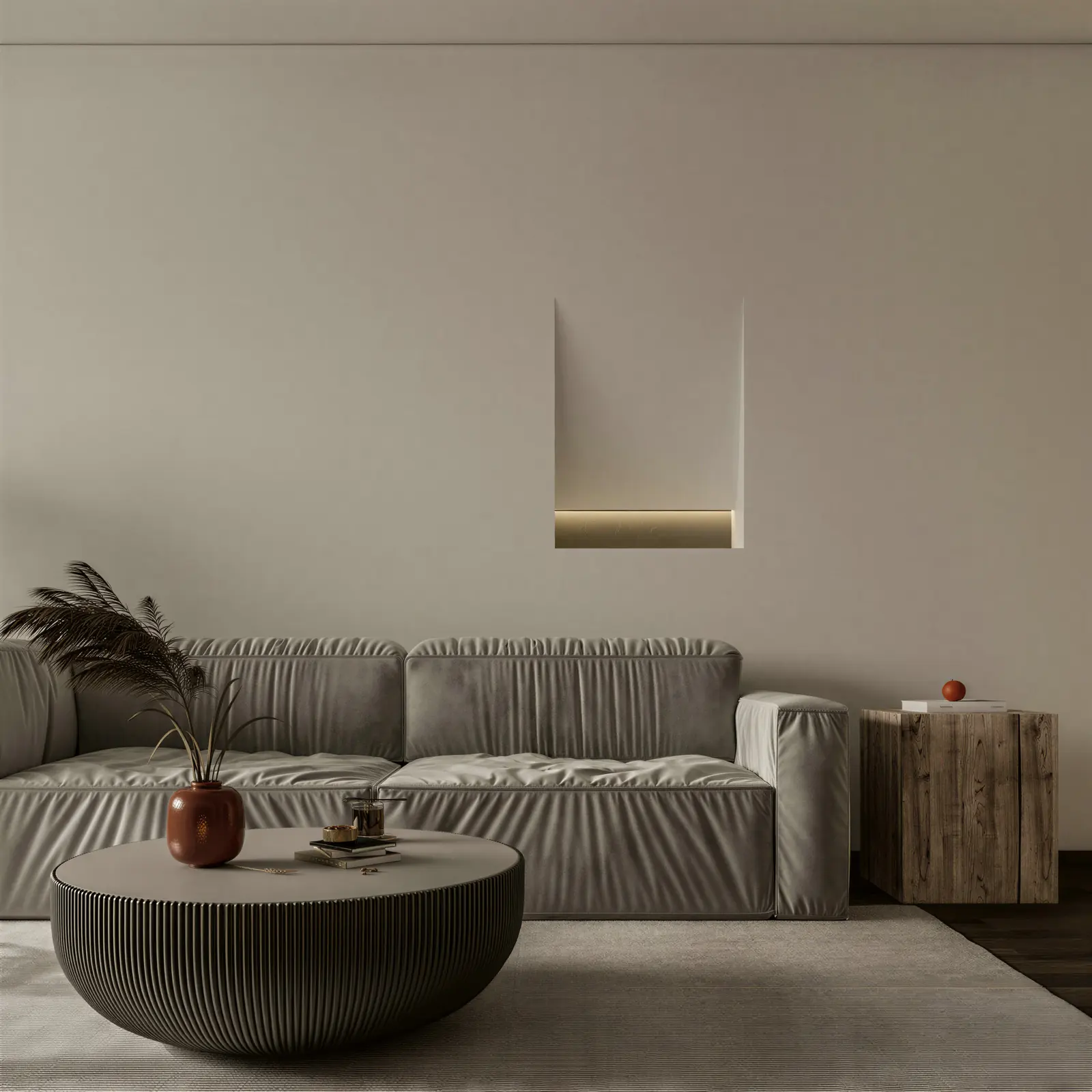 Grey sofa and round coffee table beneath a lit wall niche. Sengkang, 5-room HDB · Sengkang, renovation by ELEVATED.